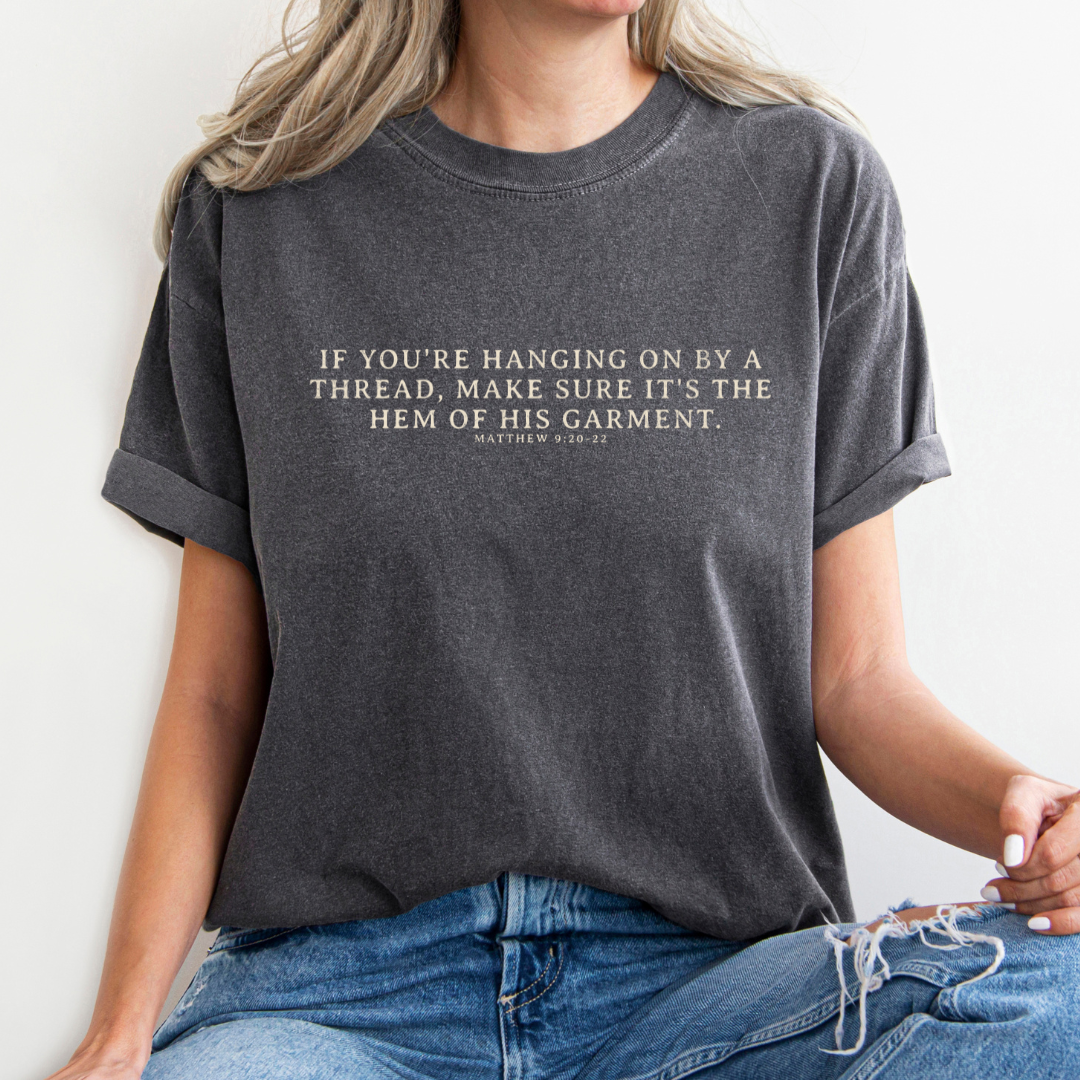 Wholehearted Motherhood and Co. - Hanging on By The Hem of His Garment Christian Graphic Tee